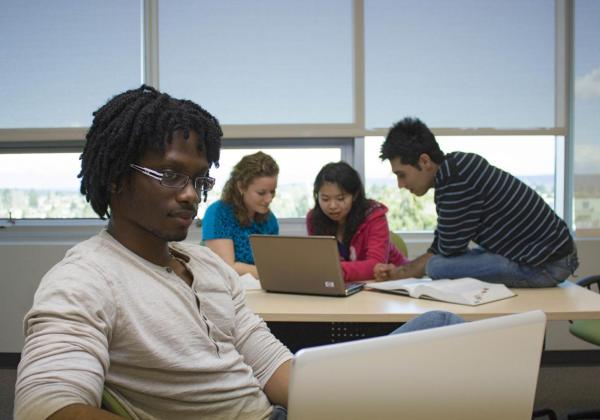 Students study together in a classroom